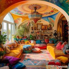 a living room filled with lots of colorful furniture and decor on top of each other