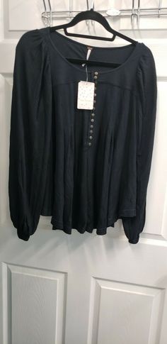 Free People size S top black retail:  $88. Black Tops For Fall Workwear, Black Fall Workwear Tops, Black Long Sleeve Top For Spring Workwear, Black Long Sleeve Top For Workwear, Spring Season, Black V-neck Long Sleeve Top For Fall, Winter Black Cotton Blouse, Casual Black Long Sleeve Blouse, Casual Black Long Sleeve Top For Fall, Black Long Sleeve V-neck Top For Fall