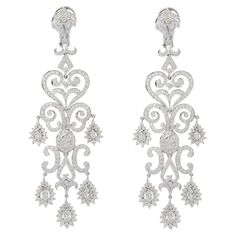 Genuine 10.76 Carats Diamond Chandelier Earrings in 18K Gold to make a statement with your look. You shall need dangle earrings to make a statement with your look. These earrings create a sparkling, luxurious look featuring round cut diamond. April birthstone diamond brings love, fame, success and prosperity. Designed with round cut diamond all over the chandelier earrings to make you stand out of any occasion or event. This is a perfect Gift for Women, Bridal Shower Gift, Valentine Gift, Gift f Luxury Handmade Fusion Chandelier Earrings, Luxury Pierced Chandelier Earrings For Anniversary, Luxury Pierced Dangle Chandelier Earrings, Luxury Pierced Chandelier Earrings For Formal Events, Luxury Bridal Clip-on Drop Earrings, Luxury Clip-on Dangle Earrings, Luxury Chandelier Earrings For Anniversary, Luxury Chandelier Drop Earrings For Anniversary, Luxury White Chandelier Earrings