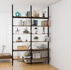 a living room filled with furniture and bookshelves