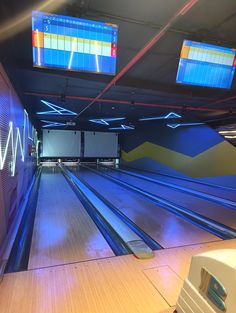 the bowling alley is empty and ready to be used for some serious bowling game nights