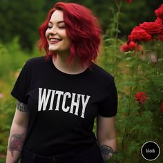 Embrace your witchy side with our Witchy Shirt. This Retro Witchy Vibes Shirt features a lightly distressed font for that perfect vintage look, ideal for spooky season or embracing witchy aesthetics year-round. Whether you're celebrating Halloween or simply love the witchy woman vibe, this shirt is a must-have addition to your wardrobe. It also makes a thoughtful gift for any mystical soul. Would you prefer this design on a Sweatshirt? Have a look at our other listings here: https://www.etsy.com/au/shop/RaidhseCreative ✦✦ All items are made to order ✦✦ They will ship within one week from one of our printing partners. Please allow sufficient time for production and shipping. Rest assured, we'll keep you informed in case of any production delays. ✦✦ Shirt Features ✦✦ Our classic unisex jerse Punk Letter Print Tops For Cosplay, Punk Style Letter Print Tops For Cosplay, Grunge Style Tops With Letter Print For Cosplay, Edgy Cotton Tops For Cosplay, Fall Cosplay Grunge Tops, Fitted Fairy Grunge Tops For Halloween, Fall Grunge Tops For Cosplay, Grunge Tops For Fall Cosplay, Fitted Black T-shirt In Fairy Grunge Style