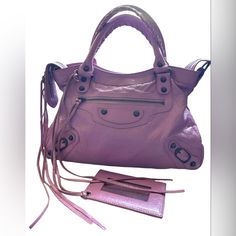 Balenciaga City Bag Color To Me Is Like Purple Pink Measures 12.5” X 9” In Good Condition Some Nail Polish And Pen Marks As Seen In Circled Last Pictures Missing Strap Firm On Price Bags Balenciaga, Balenciaga Bag, City Bag, Balenciaga City Bag, Pink Purple, Balenciaga, Nail Polish, Bag Lady, Pen