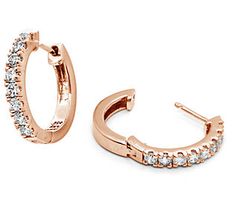 Small enough for the office and dazzling enough for dinner, these hoop earrings are perfect for everyday wear. They're accented with cubic zirconia Diamonique simulated diamonds to add a touch of sparkle to any look. Elegant Hoop Earrings With Pave Setting, Elegant Cubic Zirconia Channel Set Hoop Earrings, Elegant Pave Set Hoop Earrings, Rose Gold Small Hoop Earrings With Cubic Zirconia, Rose Gold Brilliant Cut Cubic Zirconia Huggie Earrings, Small Rose Gold Cubic Zirconia Hoop Earrings, Hoop Earrings With Pave Setting In Cubic Zirconia, Sparkling Diamond Round Huggie Earrings, Cubic Zirconia Hoop Earrings With Pave Setting