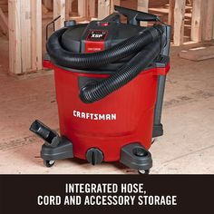 a red and black carpet cleaner with the words craftsman on it's back side