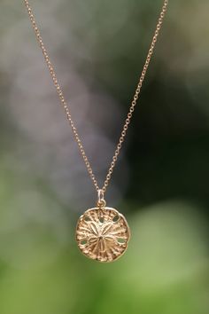 Gold sand dollar necklace  delicate necklace  a dainty by BubuRuby Beach Jewelry Aesthetic, Sand Dollar Necklace, Surf Jewelry, Preppy Jewelry, Ruby Rings, Beach Necklace, Gold Sand, Beach Necklaces, Jewelry Accessories Ideas