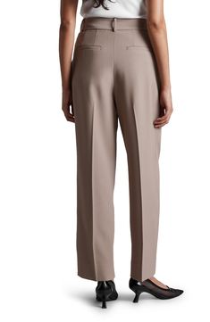 A tapered cut and front pleats define these polished yet casual pants that easily transition from the workplace to a dinner date. Zip fly with hook-and-bar closure Front slant pockets; back welt pockets 52% polyester, 48% viscose Dry clean Imported Classic Spring Career Bottoms, Classic Tapered Pants With Belt Loops, Classic Straight Leg Career Bottoms, Elegant Tapered Bottoms For Business Casual, Tailored Tapered Leg Bottoms For Career, Tailored Tapered Leg Career Bottoms, Tapered Leg Dress Pants With Welt Pockets For Work, Classic Tapered Formal Bottoms, Elegant Tapered Leg Career Dress Pants