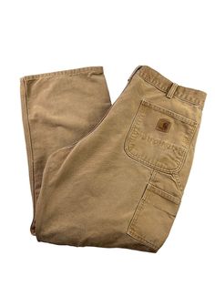 Vintage 90s Carhartt Canvas Workwear Dungaree Fit Pants Size 38W Beige MEASUREMENTS Size is based off measurements not the tagged size. Please refer to measurements. SIZE - 38 WAIST FLAT - 19" (measurement is multiplied by 2 to get the size) RISE - 12.5" INSEAM - 29" LEG OPENING - 9.5" Please note that due to the nature of pre-owned clothing; the size mentioned in the title may not be an accurate representation of the item's fit in accordance with modern sizing guides. Referring to the measureme Retro Trousers, Apparel Design Inspiration, Carhartt Pants, Fits Clothes, Fit Pants, Outfit Goals, Dungarees, Apparel Design, Workout Pants