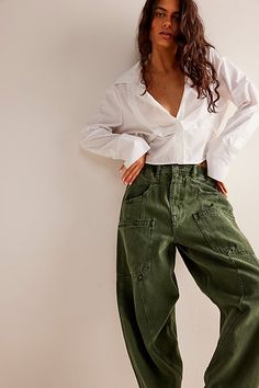 A contemporary take on cargo, these off-duty jeans from our We The Free collection will be your go-to from this season to the next. **Fit:** Mid-rise, relaxed straight silhouette **Features:** Zip fly and button closure, oversized cargo pockets throughout, utility-inspired seaming, colorblock design **Why We ❤ It:** A subtle touch of edge to your bottoms collection, pair these with sporty sneakers or sleek loafers for endless ways to wear. | We The Free New School Relaxed Jeans at Free People in Boyfriend Jeans Outfit Summer, Cargo Pant Outfits, Lesbian Outfits, Olive Jeans, Lesbian Fashion, Jeans Outfit Summer, Sporty Sneakers, All Jeans, Green Jeans