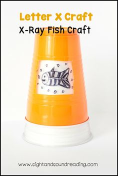 an orange and white cone shaped object with the words letter x - ray fish craft on it