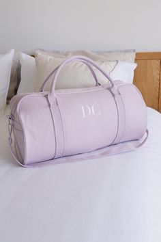 Make packing for sleepovers a breeze with our personalised unique duffle bag. Crafted from sturdy cotton canvas and featuring matching hardware and zippers, it can carry everything you need for your next adventure. Plus, its additional shoulder strap lets you carry your keepsakes with comfort and style. Details Outer is crafted from cotton canvas, lined in dyed to match cotton with small internal zipper pocket. High quality hardware and zipper in matching colour Price includes the embroidery (additional for metallic thread) Dimensions of the bag are 54cm x 38cm x 25cm Our current turnaround time for personalisation is 5 business days (this does not include delivery time, allow 3-5 business days for worldwide delivery). Price includes embroidery, simply add your embroidery details as below: Mulberry Color, Weekender Bags, Bridesmaid Bags, Sleep Over, Rose Gold Hardware, Hospital Bag, Gold Embroidery, Duffle Bags, Personalize Bag