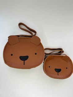 This adorable bear purse is made of PU leather and is very durable.  Perfect to match your little ones outfit.  This can be worn as a crossbody bag or shoulder bag.  It has a zipper closure to ensure all belongings are safe and an adjustable strap.   This is a gift for your little one especially on their birthday or holidays. Size: Small - 12 x 9.5 x 3cm / 4.72 x 3.74 x 1.18in Big - 16.5 x 12.6cm / 6.49 x 4.96in Cute Brown Everyday Shoulder Bag, Cute Animal Design Crossbody Shoulder Bag, Cute Leather School Shoulder Bag, Cute Leather Shoulder Bag For School, Cute Bear Design Bags For Gifts, Cute Bear Design Bags For Gift, Cute Brown Bag With Adjustable Strap, Cute Bear Design Bags As Gifts, Cute Brown Bag With Animal Design