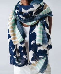 Forget what you know about flowery scarfs — this graphic wrap is a forget-me-not. It's a lightweight staple that makes a perfect warm-weather signature. Dimensions: 30" X 80" Fabrication: 76% cotton, 24% linen Blue Cotton Summer Scarves, Blue Scarves For Spring, One Size, Blue One Size Scarves For Spring, One Size Blue Scarves For Spring, Summer Cotton Scarf With Floral Print, Spring Floral Print Patterned Scarf, Spring Green Cotton Scarves, Green Cotton Scarves For Spring, Spring Floral Print Beach Scarves