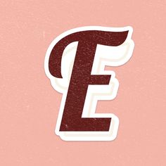 the letter e is made up of red and white stickers on a pink background