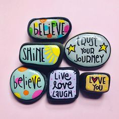 painted rocks with words on them that say, believe, i just your journey and live love laugh