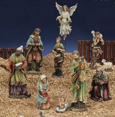 the nativity scene includes seven figurines, including two baby jesus and three wise men