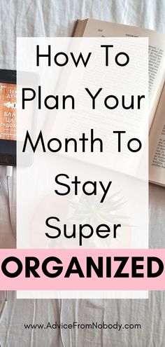 an open book and headphones on top of a bed with text overlay how to plan your month to stay super organized