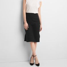 This Stretchy And Super Soft Pencil Skirt Is Perfect For Transitioning To Warmer Weather! It Would Work Very Well As An Addition To The Office Wardrobe. It's Never Been Worn And Still Has Its Tags. 59% Cotton 40% Modal 1% Spandex Machine Washable Tumble Dry Low Flattering Black Bottoms For Work, Flattering Black Skirt For Spring, Versatile Black Midi Skirt, Versatile Fitted Black Skirt, Black Fitted Versatile Skirt, Flattering Stretch Black Skirt, Flattering Black Stretch Skirt, Casual Stretch Pencil Skirt For Workwear, Black Summer Pencil Skirt For Workwear