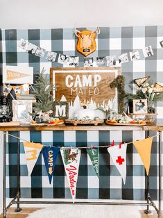 a table topped with lots of food and decorations