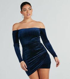 This glitter velvet mini dress is the perfect touch of sparkle for the party season! Featuring a figure-enhancing bodycon fit and off-the-shoulder design with fitted long sleeves, you'll make a glamorous statement while the side ruched seam and wrap mini-length hem add extra flair. Complete the look in platform heels for a holiday party!Fit & FeaturesOff-the-shoulder, fitted long sleevesBodycon fit, side ruched seamWrap mini-length hemGlitter velvet fabric, moderate stretchRuns true to size Glamorous Velvet Bodycon Dress For Night Out, Glamorous Fitted Long Sleeve Off Shoulder Dress, Long Sleeve Glitter Mini Dress For Date Night, Glamorous Off-shoulder Bodycon Mini Dress, Off-shoulder Velvet Party Dress, Winter Party Fitted Off Shoulder Dress, Off-shoulder Velvet Dress For Night Out, Winter Party Off Shoulder Fitted Dress, Fitted Off Shoulder Dress For Winter Parties