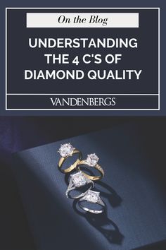 three diamond rings sitting on top of a blue book with the title, on the blog