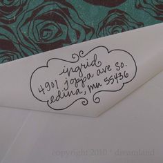 a close up of an envelope with writing on it