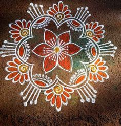 a flower design is painted on the ground