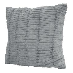 a gray pillow on a white background