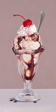 an ice cream sundae with cherries and nuts