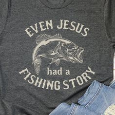 THE STORY "Celebrate Faith and Fishing with Our 'Even Jesus Had a Fishing Story' Shirt!" Combine your love for fishing and your faith with a shirt that highlights the timeless connection between the two. The "Even Jesus Had a Fishing Story" shirt is perfect for those who enjoy casting lines and sharing stories, all while celebrating their spiritual journey. THE FIT True-to-fit. If you prefer a looser fit, we recommend ordering one size larger than normal. SPECS "Printed on Bella Canvas short-sle Fishing Outfits For Women Summer, Warrior Training, Green Font, Gifts For Pastors, Fishing Outfits, Fishing T Shirts, Jesus Shirts, Diy Shirt, Country Outfits