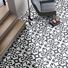 a black and white patterned floor in a living room