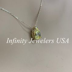 "This pendant is a pear shape yellow simulated diamond made with pure 14k yellow gold and 18\" yellow gold cable chain included item #5697 Approximate total carat weight: 2.00ctw diamond equivalent -Center Stone Size: 10x7mm -Gem Type: Simulated Diamond -Center Stone Shape: Pear Shape -Center Stone Color: Yellow -Center Stone Clarity: VVS1 -Metal Type and Purity: 14k Yellow Gold -Chain: 18\" delicate 14k gold chain / heavier option with lobster claw available (use dropdown to select) -Country of Gold Solitaire Teardrop Necklace With Prong Setting, Gold Teardrop Solitaire Necklace With Prong Setting, Teardrop Anniversary Drop Necklace In Fine Jewelry Style, Teardrop Fine Jewelry Drop Necklace For Anniversary, Fine Jewelry Teardrop Drop Necklace For Anniversary, Yellow Gold Teardrop Pendant Necklace For Anniversary, Gold Drop Solitaire Necklace For Anniversary, Gold Teardrop Pendant Solitaire Necklace For Anniversary, Fine Jewelry Pear-shaped Drop Necklace For Anniversary