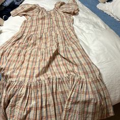 The Great, The Iris Dress In Rose-Washed Plaid, Size 3, Worn Only Once, Perfect Condition Daywear Prairie Dress With Ruffles, Prairie Dress With Ruffles For Daywear, Ruffled Prairie Dress For Daywear, Ruffled Short Sleeve Dress For Gatherings, Prairie Daywear Dresses With Ruffles, Prairie Ruffle Dress For Daywear, Prairie Style Ruffle Dresses For Daywear, Prairie Style Ruffled Dresses For Daywear, Spring Prairie Dress With Ruffles