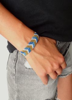 Brazilian bracelet for men or women, ethnic pattern, handmade in macrame with high quality waxed polyester string, resistant to water and sun. Waterproof bracelet to wear in all circumstances even in water. Dimensions: Adjustable waist on all wrists thanks to the sliding knot. Width: 2 cm  Weaving length of 14,5cm. 2 Colors available:  - BLUE / brown / white  - GREEN / brown / white  - Other colors on request Gift idea. Other macrame bracelets to discover on the shop: - https://www.etsy.com/en/l Casual Handwoven Beaded Bracelets For Beach, Beach Woven Friendship Bracelets, Casual Handwoven Braided Bracelets For Beach, Handwoven Beaded Bracelets For Summer Beach, Handwoven Beaded Bracelets For Beach In Summer, Casual Macrame Beaded Bracelets For Friendship, Summer Beach Handwoven Beaded Bracelets, Blue Handwoven Bracelets For Beach, Handwoven Blue Bracelets For The Beach