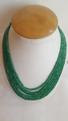 PRODUCT DESCRIPTION :--Beautiful Four Strands Beryl Emerald Necklace ✦ Stone Name :--- Beryl Emerald ✦ Gemstone Shape:---  Rondelle ( Faceted )    Carats:-- 500     Strands:--6 ✦ Length :--  18 Inches  TO 20 Approximate Without Tassel/clasp ✦ Color : --  green ✦ Quality:-- AAA ✦ Size : 4-5 mm Beryl is a most alluring and popular mineral. It occurs in a diversity of colors, and has several important gemstone varieties. The green variety, beryl  Emerald, is one of the most precious gems. Only gree Rondelle Emerald Gemstone Beads Necklace, Luxury Faceted Rondelle Emerald Necklace, Emerald Faceted Beaded Necklaces, Luxury Green Multi-stone Beaded Necklace, Multi-strand Green Faceted Beads, Ruby Beads, Emerald Bead, Yellow Stone, Emerald Necklace