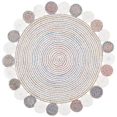 the circular rug is made out of different colored circles