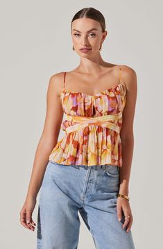 Pleated floral top with small triangle cutout at bust Concealed zipper at side seam Adjustable straps, partially lined at bust Self: 100% Polyester / Lining: 100% Polyester Dry clean only Style #ACT18314 Astr The Label, Mini Dress Shop, Spring Tops, Yellow Floral, S Models, Floral Tops, Spring Outfits, New Dress