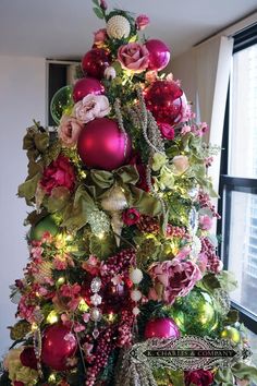 a christmas tree decorated with ornaments and lights