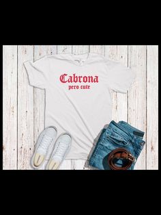 Cabrona Shirt Other colors may also be available. Long Sleeve T-Shirts, Sweatshirts and/or Hoodies are also available. Just send us a message and we will happily make it happen. If you need your item by a certain date please contact me so that we can work with you. If you have any problem with your order please feel free to contact us. T-Shirt:  Gildan Soft Style G6400 Solid Colors:4.5 oz/sq yd, 100% Ring Spun Cotton  Heathered Colors: 65% poly/35% cotton, Sport Grey 90%cotton/10%poly T-Shirt Ca Cute Converse, Make It Happen, Soft Style, Houston Tx, Solid Colors, Long Sleeve Tshirt, Houston, Spun Cotton, Solid Color