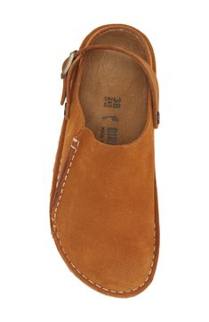 A convertible slingback strap adds dual functionality and styling options to a classic suede clog grounded by a contoured, arch-supporting footbed. Adjustable slingback strap with buckle closure Contoured cork footbed with arch support Leather upper and lining/synthetic sole Imported Arch Support Slippers, Teacher Fits, Birkenstock Men, Jeweled Shoes, Suede Clogs, Fall Shoes, Cool Boots, Dream Shoes, Christmas Signs