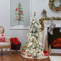 a decorated christmas tree in front of a fireplace