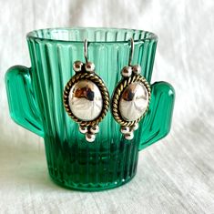 "Vintage Mixed Metal Mexican Earrings Sterling Silver Dome Drops Brass Gold Colonial Style These beautiful sterling silver dome dangles will become your go-to earrings for everyday wear. These earrings dangle a total of 1 1/2\" (4 cm) long from the top of the ear wires to the bottom of the drop and just over 5/8\" (17 mm) wide. They are stamped with a Mexican maker's mark on the back of one. They have a combined weight of 13.75 grams. They are in excellent vintage condition with minimal signs of age and previous wear.  Are they a gift? Need to buy a card? All cards ship free with purchase. http://www.etsy.com/shop/AdobeHouseVintage?section_id=13802190 Thanks so much for looking!" Mexican Earrings, Tear Drops, Handmade Gift Tags, Sterling Silver Drop Earrings, Colonial Style, Brass Gold, Maker's Mark, Silver Drop Earrings, Mixed Metals