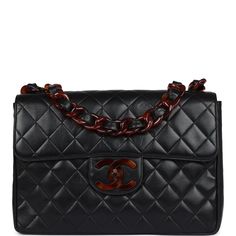 This vintage Chanel Jumbo Single flap bag is in black lambskin leather with tortoiseshell Bakelite hardware and features tonal stitching, a front flap with signature CC turnlock closure, half moon back pocket, and adjustable interwoven tortoiseshell Bakelite hardware chain link and black leather shoulder strap.The interior is lined in burgundy leather and has one zip pocket with a CC pull and a slip pocket underneath.Collection: 3-series (1994-1996)Origin: FranceCondition: Vintage; Excellent - T Black Satchel Flap Bag With Cc Turnlock, Luxury Black Flap Bag With Cc Turnlock Closure, Black Satchel Flap Bag With Cc Turnlock Closure, Luxury Black Leather Flap Bag, Black Leather Shoulder Bag With Cc Turnlock, Black Leather Shoulder Bag With Cc Turnlock Closure, Luxury Black Calf Leather Flap Bag, Luxury Black Double Flap Bag, Vintage Black Bag With Cc Turnlock Closure