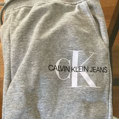 Calvin Klein Monogram Sweatpants. Bought Large By Mistake. Am A Medium. Never Worn. Smoke Free Home. Logo Print Cotton Pants For Loungewear, Cotton Logo Print Loungewear Pants, Cotton Loungewear Pants With Logo Print, Casual Pants With Logo Print For Loungewear, Relaxed Fit Cotton Bottoms With Logo Print, Casual Cotton Pants With Logo Print, Casual Stretch Bottoms With Logo Print, Gray Letter Print Pants For Loungewear, Trendy Cotton Bottoms With Logo Print