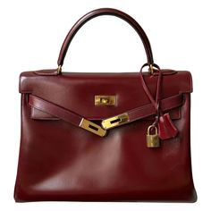 Exquisite 1955 Hermès Kelly 32 Retourné Rouge H Box Calf Leather Handbag For Sale at 1stDibs Hermes Rare Bag, Handbag Still Life Photography, Vintage Hermes Tote Bag, Hermes Kelly 32 Street Style, Rare Hermes Bags, 50s Handbags, Vintage Kelly Bag, Vintage Hermes Bag, Timeless Handbags