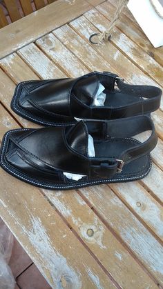 Handmade Pakistani Leather Peshawari Chappal / Sandal Black UK size 7.5, 8 , 8.5 EU41.5, 42 & 42.5 Mens Peshawari Pakistani Halal Leather Chappal/Sandal Black For an unique appearance wear Top Quality, Stylish, Traditional Men's Pakhtoon, Afghani, Peshawari, Pakistani Handmade Halal Leather Chappal strapped Sandal  Pakistani Halal Leather Chappal /Sandal Buckled A little variation is possible in the UK & Pakistani sizes. Reflection can make a little bit of variation in the colors. Adults wear wi Traditional Black Sandals With Single Toe Strap, Black Closed Toe Sandals For Festivals, Traditional Black Closed Toe Sandals, Shalwar Kameez, Newest Trends, Strap Sandals, Black Sandals, Women's Shoes Sandals, About Uk