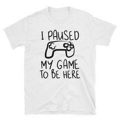 I Paused My Game To Be Here Shirt, Gaming T-shirt, Gamers T-shirt, Gaming T-shirt, Gamer Shirt, Gamer Gift, Game Controller Shirt, Short-Sleeve Unisex T-Shirt You've now found the staple t-shirt of your wardrobe. It's made of a thicker, heavier cotton, but it's still soft and comfy. And the double stitching on the neckline and sleeves add more durability to what is sure to be a favorite! • 100% ringspun cotton • 4.5 oz/y² (153 g/m²) • Pre-shrunk • Shoulder-to-shoulder taping • Quarter-turned to Funny White T-shirt With Letter Print, Funny White Print Crew Neck T-shirt, White Gamer T-shirt With Graphic Print, White Gamer Graphic Print T-shirt, Gamer T-shirt With Crew Neck And Pre-shrunk, Gamer T-shirt With Screen Print And Crew Neck, Funny White Slogan T-shirt, Funny Slogan White T-shirt, Funny White T-shirt With Slogan