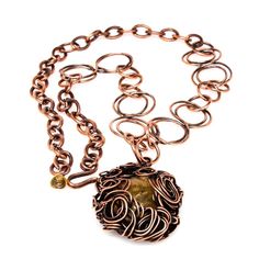 This captivating copper pendant necklace is one you’ll want to pass down through the generations thanks to its vintage-inspired design and timeless style. A golden chunk of natural Baltic amber takes center stage inside of an alluring array of hand-molded copper wire swirls – some perfect, and some not-so-perfect – to represent all the beautiful and unique moments that have made you unforgettable. The one-of-a-kind copper pendant dangles from hand-formed double-infinity links interspersed with c Wire Swirls, Double Infinity, Bold Statement Jewelry, Wearable Art Jewelry, Golden Amber, Hand Molding, Copper Pendant, Copper Chain, Copper Pendants