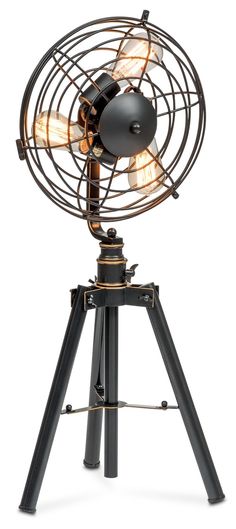 an old fashioned fan on top of a tripod with light bulbs in the middle