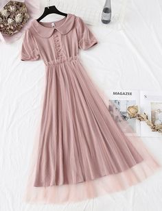 Pink tulle dress fashion girl dress summer dressFabric: tulleColor: pink, champagneSize(cm): S, M, L, XLS length 121cm bust 88cm sleeve length 24cmM length 122cm bust 92cm sleeve length 25cmL length 123cm bust 96cm sleeve length 26cm&ltp&gtXL length 124cm bust 100cm sleeve length 27cm&lt/p&gt&ltbr/&gt Summer Pink Tulle Tutu Dress, Pink A-line Dress With Tulle Skirt, Summer Short Sleeve Tulle Dresses, Summer Short Sleeve Tulle Tutu Dress, Spring Short Sleeve Tutu Dress With Tulle Skirt, Summer Tulle Tutu Dress, Summer Tulle Skirt Dress With Short Sleeves, Spring Pink Solid Color Dress, Summer Pink Princess Dress With Tulle Skirt